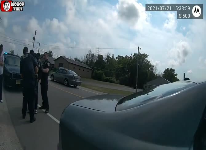 Video :Was a police officer caught putting narcotics in the vehicle of two suspects